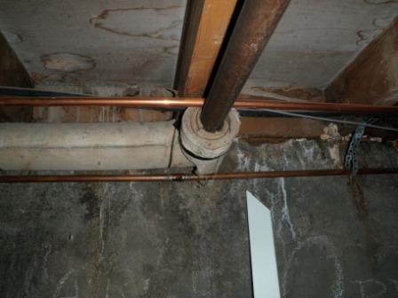 This is a photo from the Orillia home inspector. biz-heating  evidence files. As an Orillia  home inspector  I have found during home cottage and commercial inspection that there are some clues left from old installations no one is happy to find. This photo is of pipes found during a commercial inspection north of Orillia. It is wrapped with what appears to be old pipe insulation. Of course there is an automatic assumption that this wrap contains asbestos, however, that may not be the case. There were other inert materials used in pipe insulation. Only proper sampling and testing by a recognized and certified lab can determine if in fact asbestos exists.  